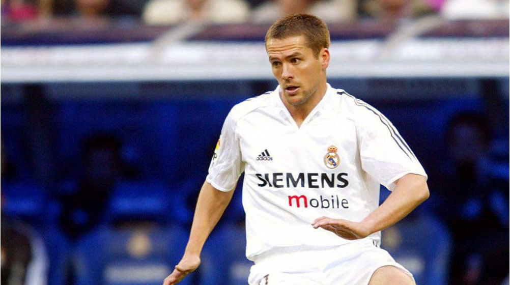 Michael Owen wearing the Real Madrid home jersey while playing for them