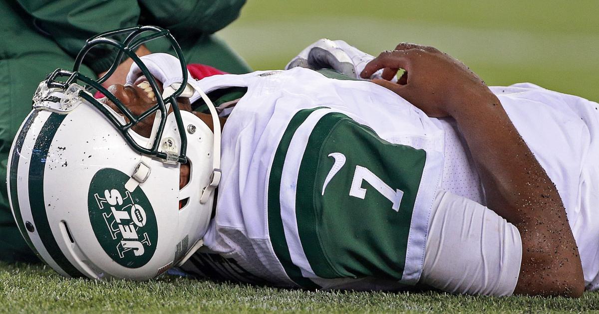 Geno Smith Laying On The Ground