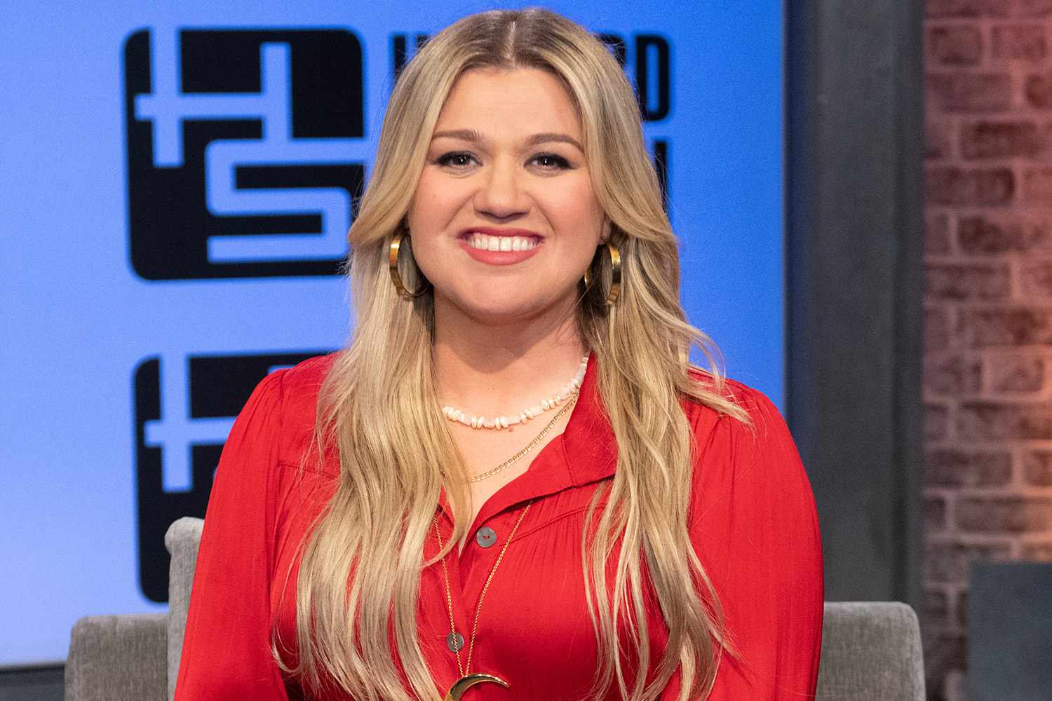 Kelly Clarkson wearing a red outfit