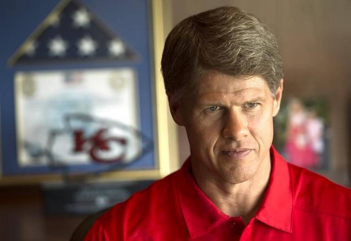 Clark Hunt wearing a red polo shirt