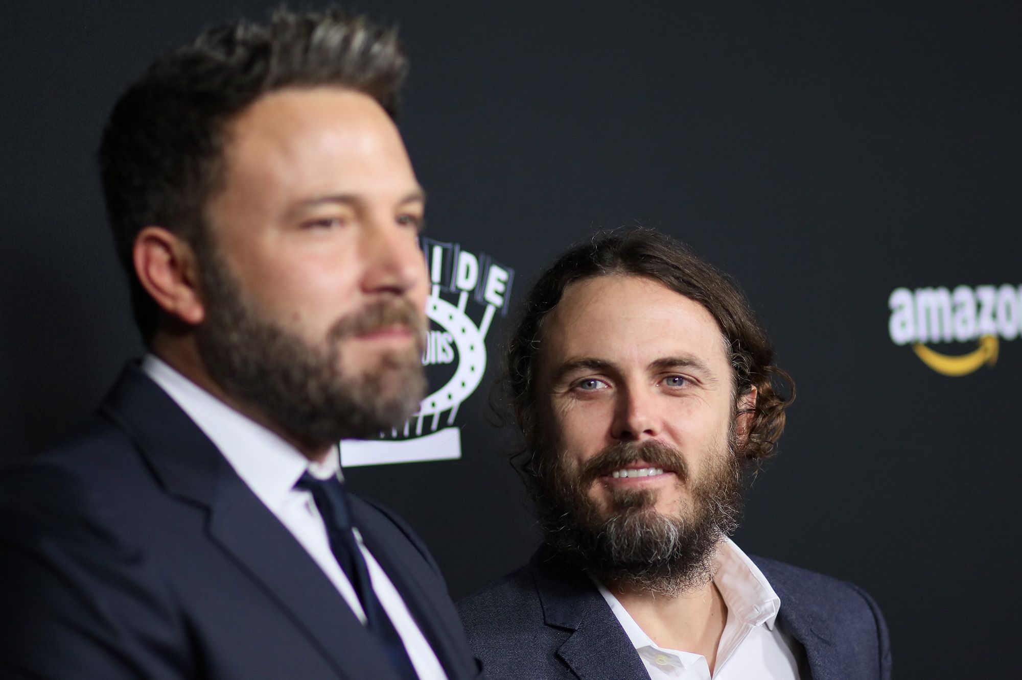 Casey Affleck with his brother Ben Affleck at an event