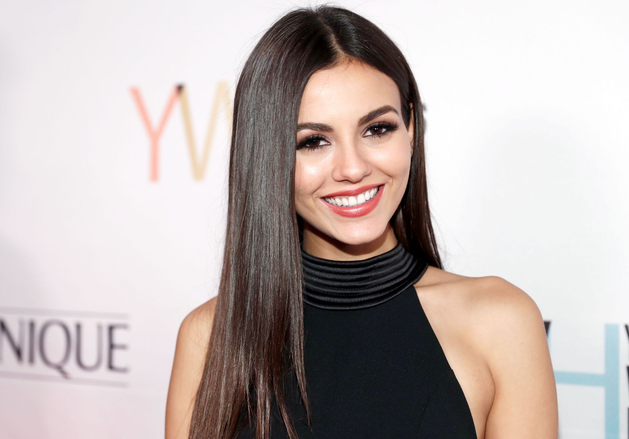 Victoria Justice wearing a black outfit