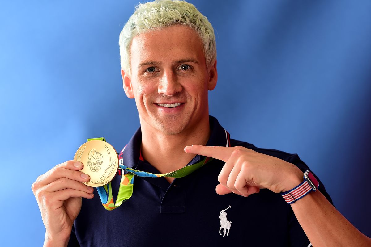 Ryan Lochte showing his medal