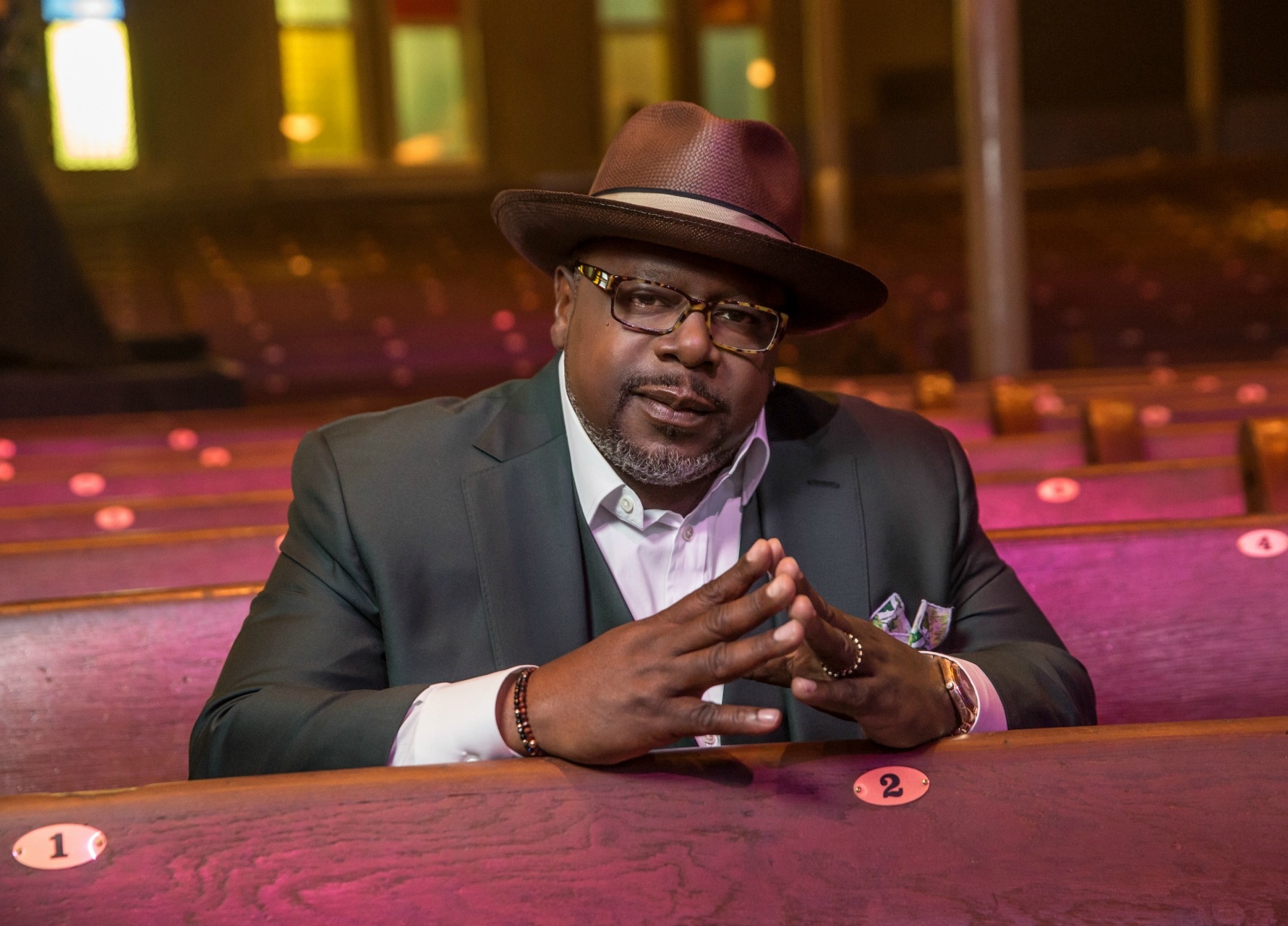 Cedric The Entertainer wearing a gray suit