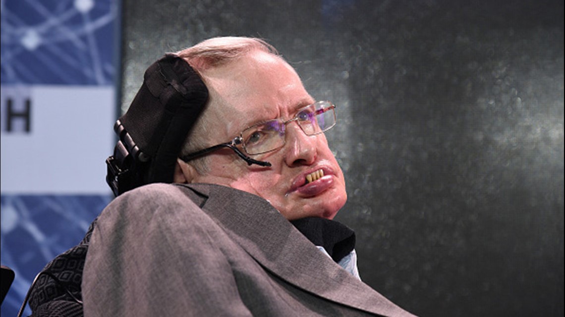 Stephen Hawking wearing a gray suit