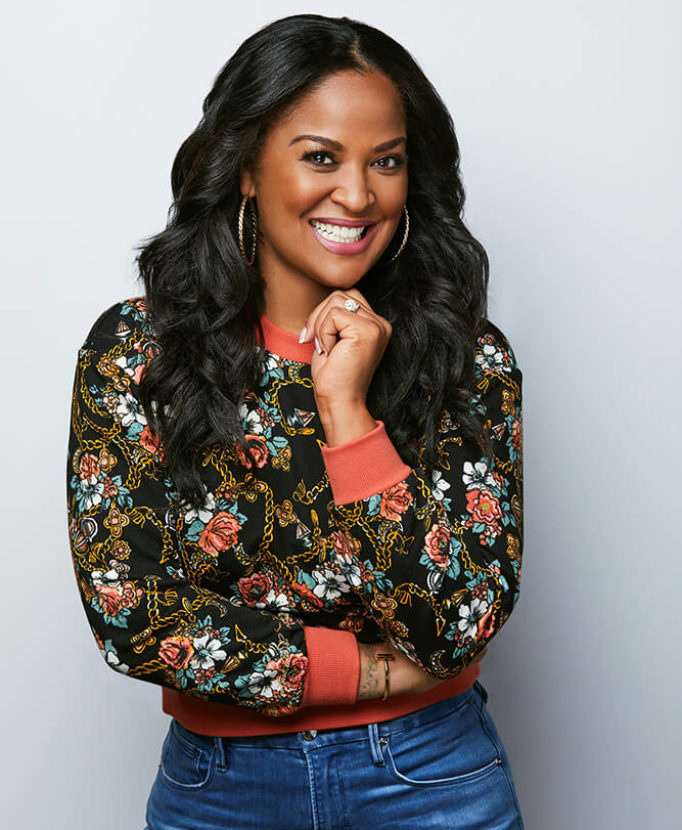 Laila Ali wearing a flowered blouse