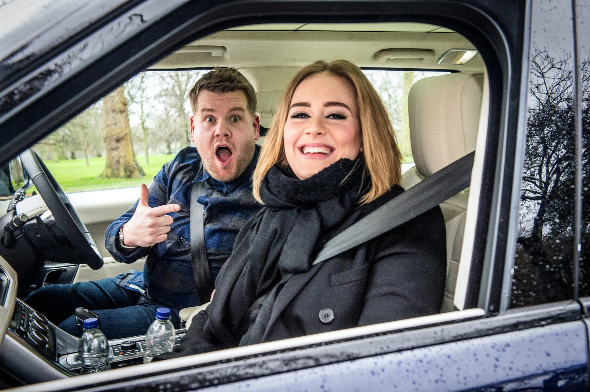Adele and james corden in a car