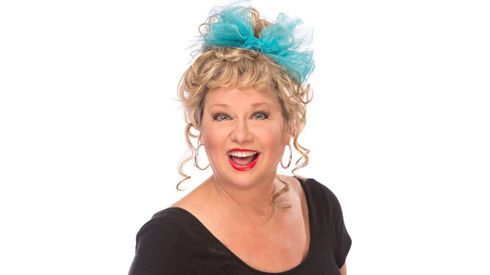 Victoria Jackson wearing a blue bow